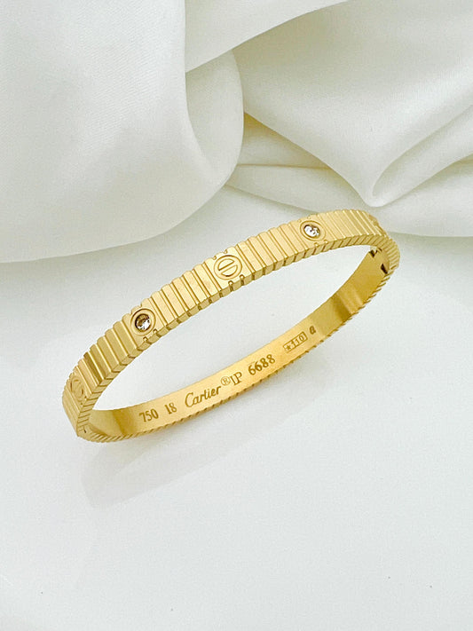 Luxury Gold Ribbed Handcuff Bracelet – Premium Stainless Steel Bangle for Women